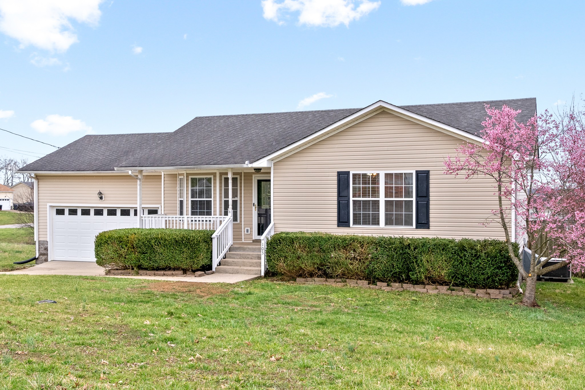 103 Meridians Way Oak Grove, KY 42262 - Photo 3 of 32 a front view of a house with a garden