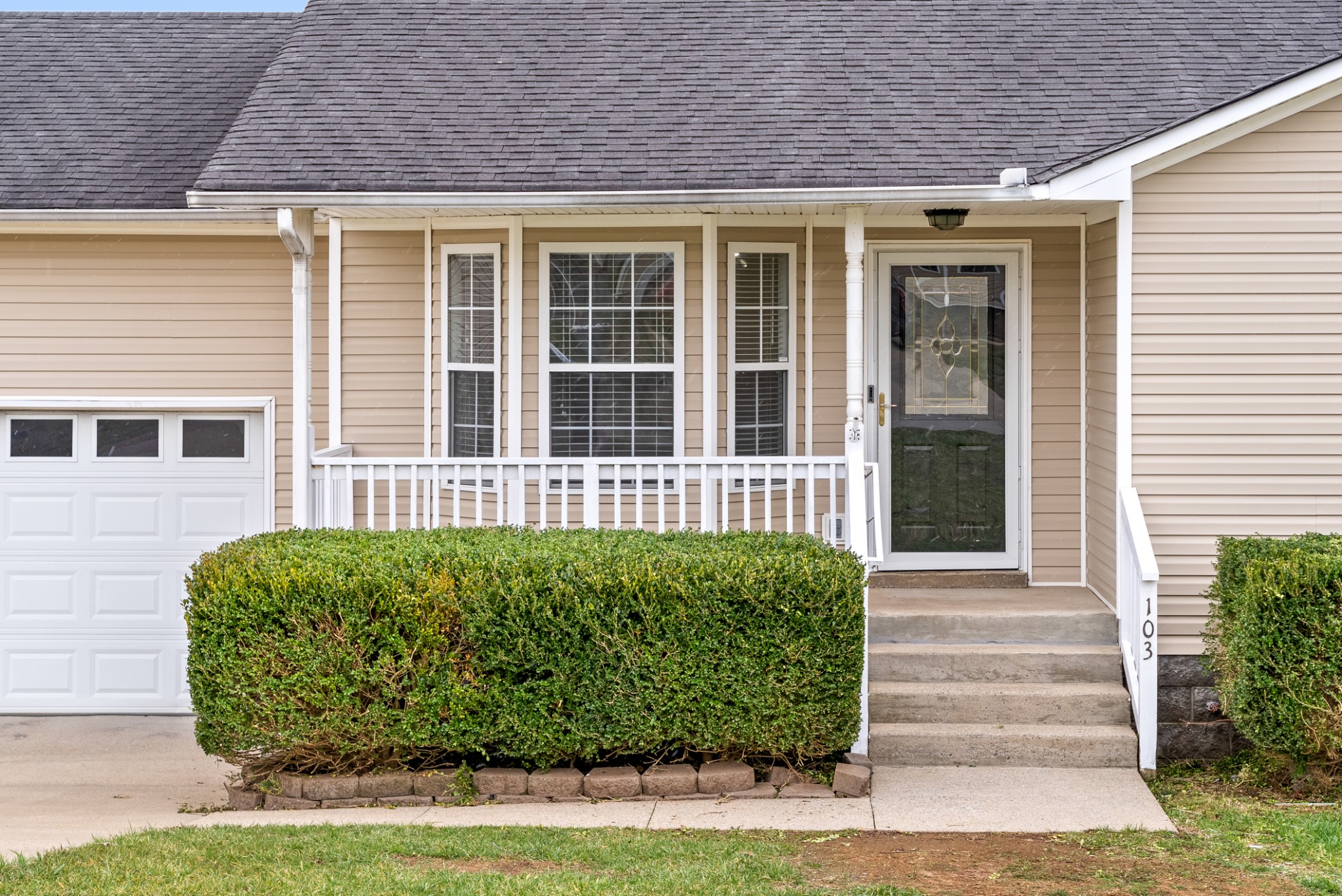 103 Meridians Way Oak Grove, KY 42262 - Photo 4 of 32 a front view of a house with a garden