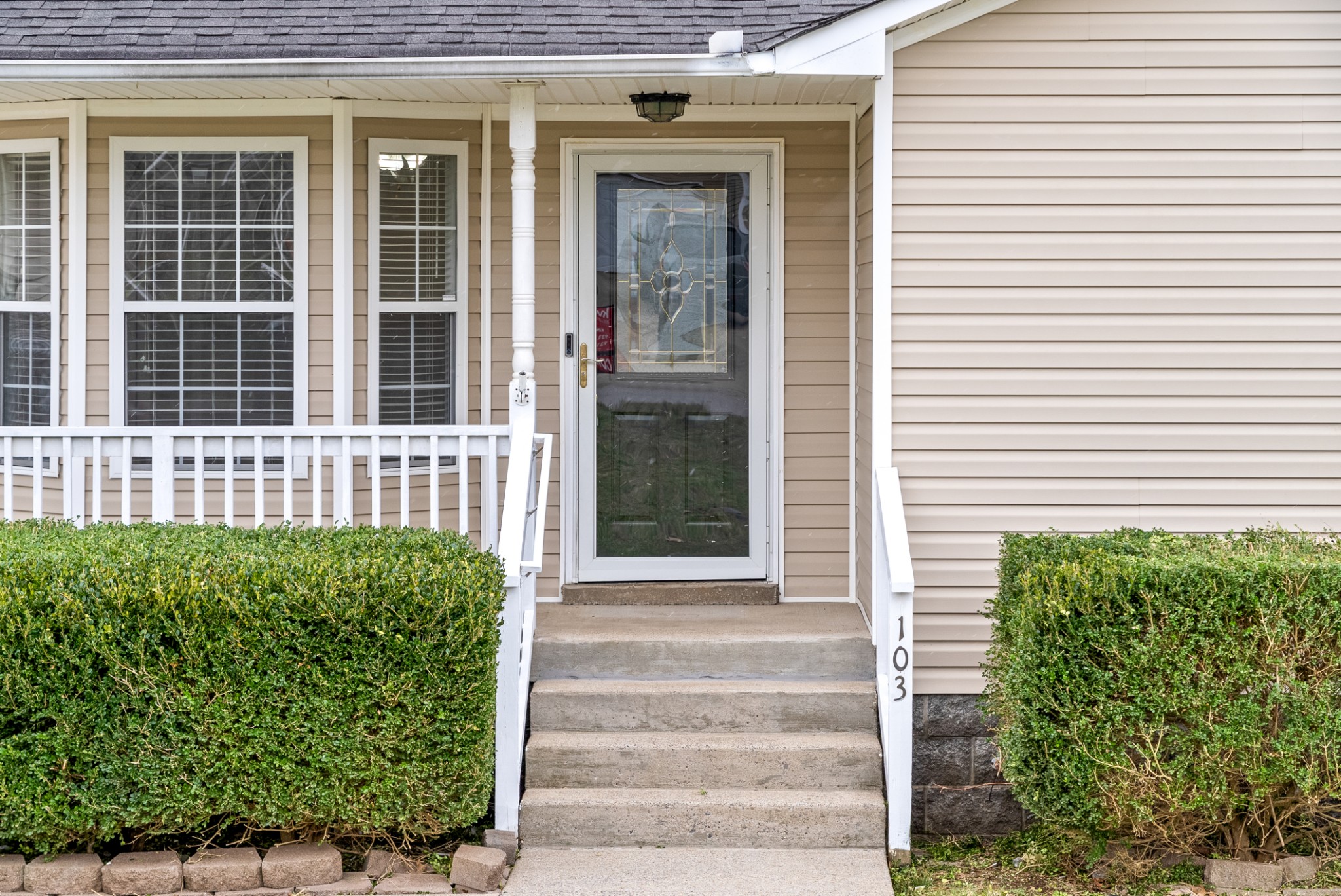 103 Meridians Way Oak Grove, KY 42262 - Photo 5 of 32 a front view of a house with a garden