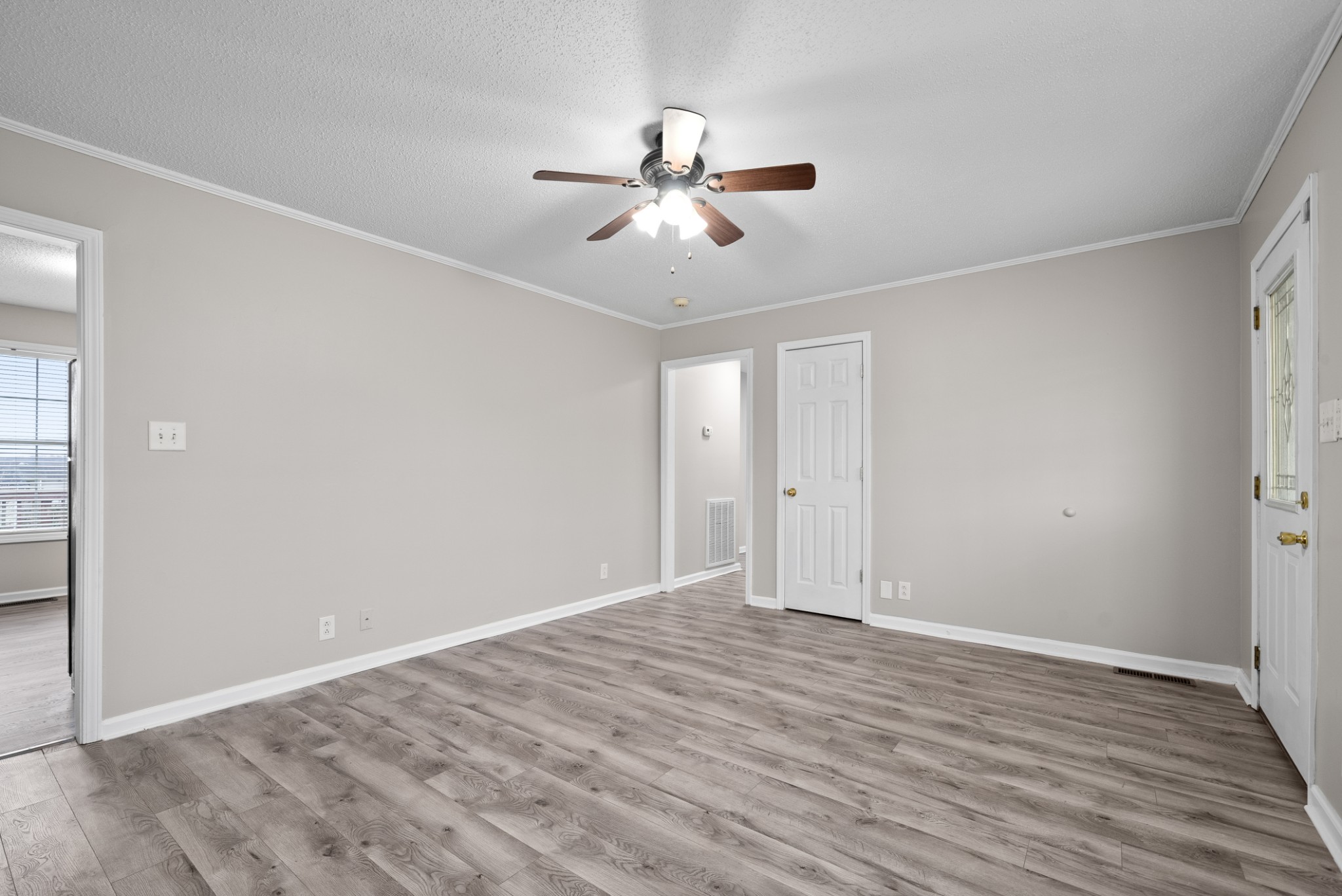 103 Meridians Way Oak Grove, KY 42262 - Photo 8 of 32 a view of empty room with wooden floor and fan
