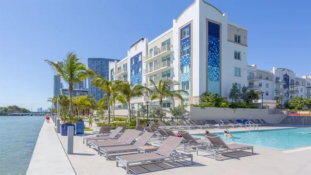 a view of a chairs and table in patio