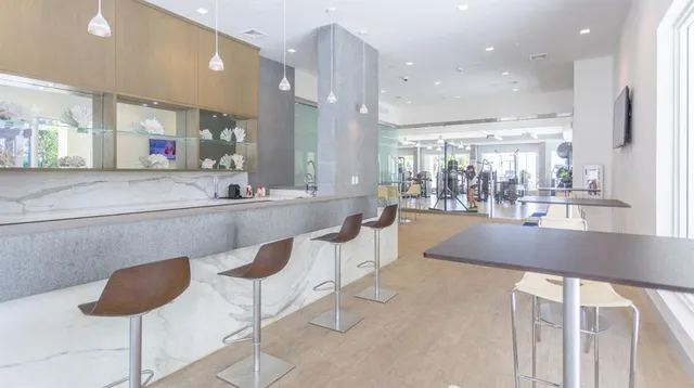 view of a lake with building in front of it