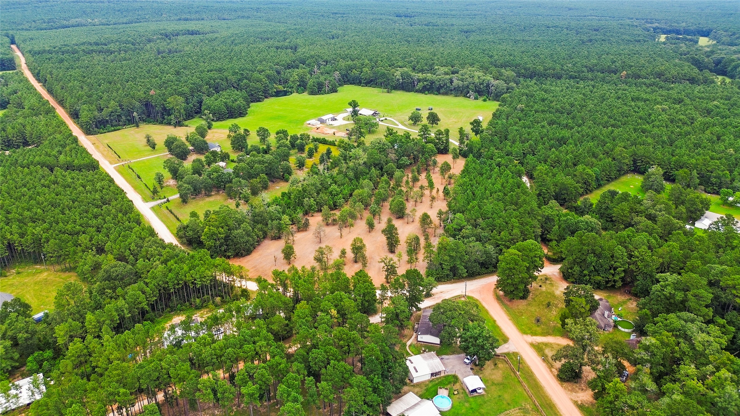 Tbd Big Woods Road New Waverly, TX 77358 - Photo 11 of 11 an aerial view of a residential houses with yard