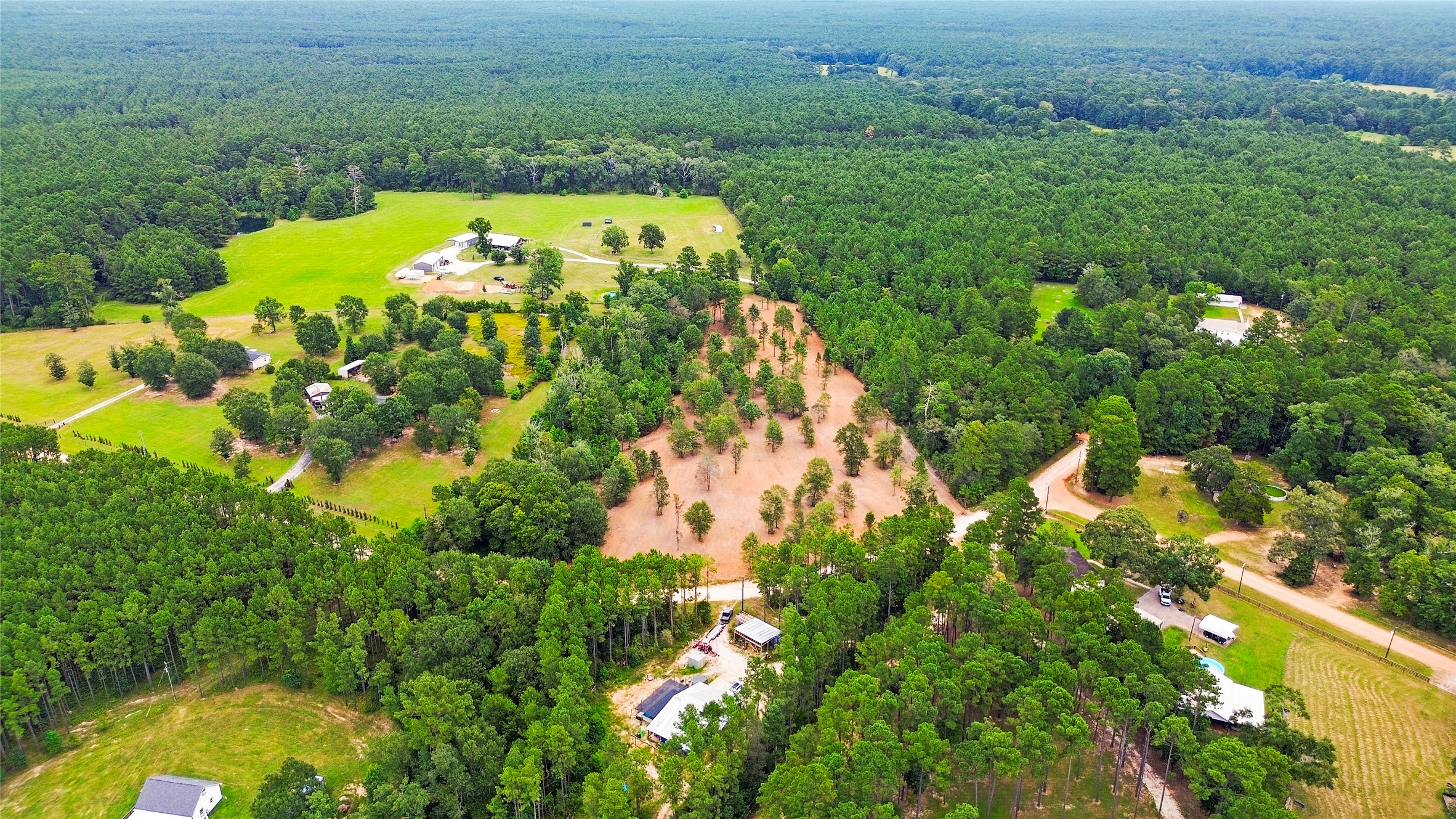 Tbd Big Woods Road New Waverly, TX 77358 - Photo 10 of 11 a view of a lake with a yard