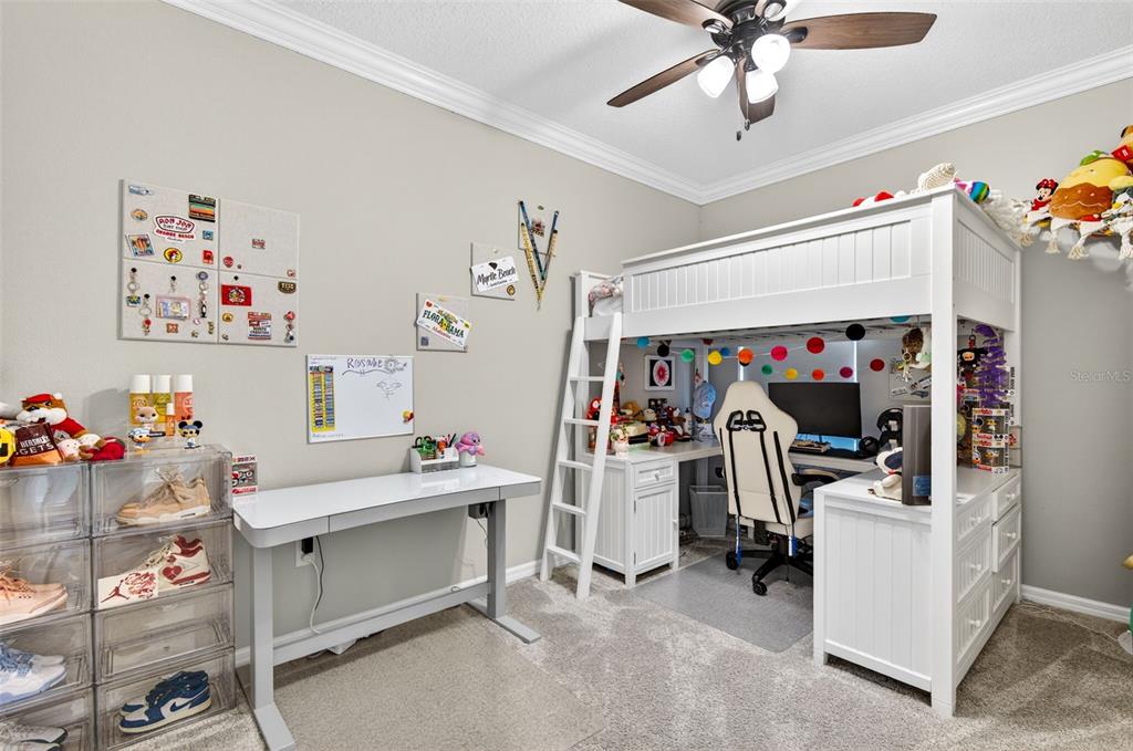 6427 Mooring Line Circle Apollo Beach, FL 33572 - Photo 21 of 34 a view of a room with toys and a chandelier