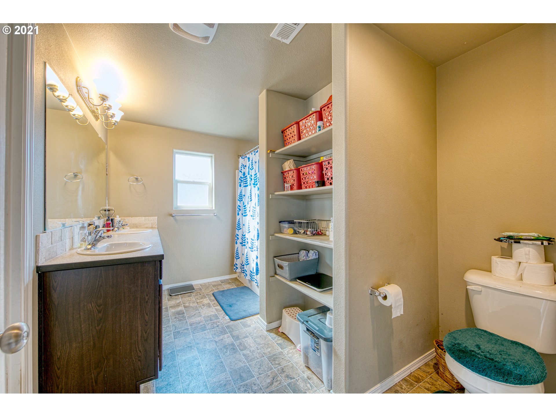 1962 Adelman Loop Eugene, OR 97402 - Photo 15 of 22 a bathroom with a sink and a mirror