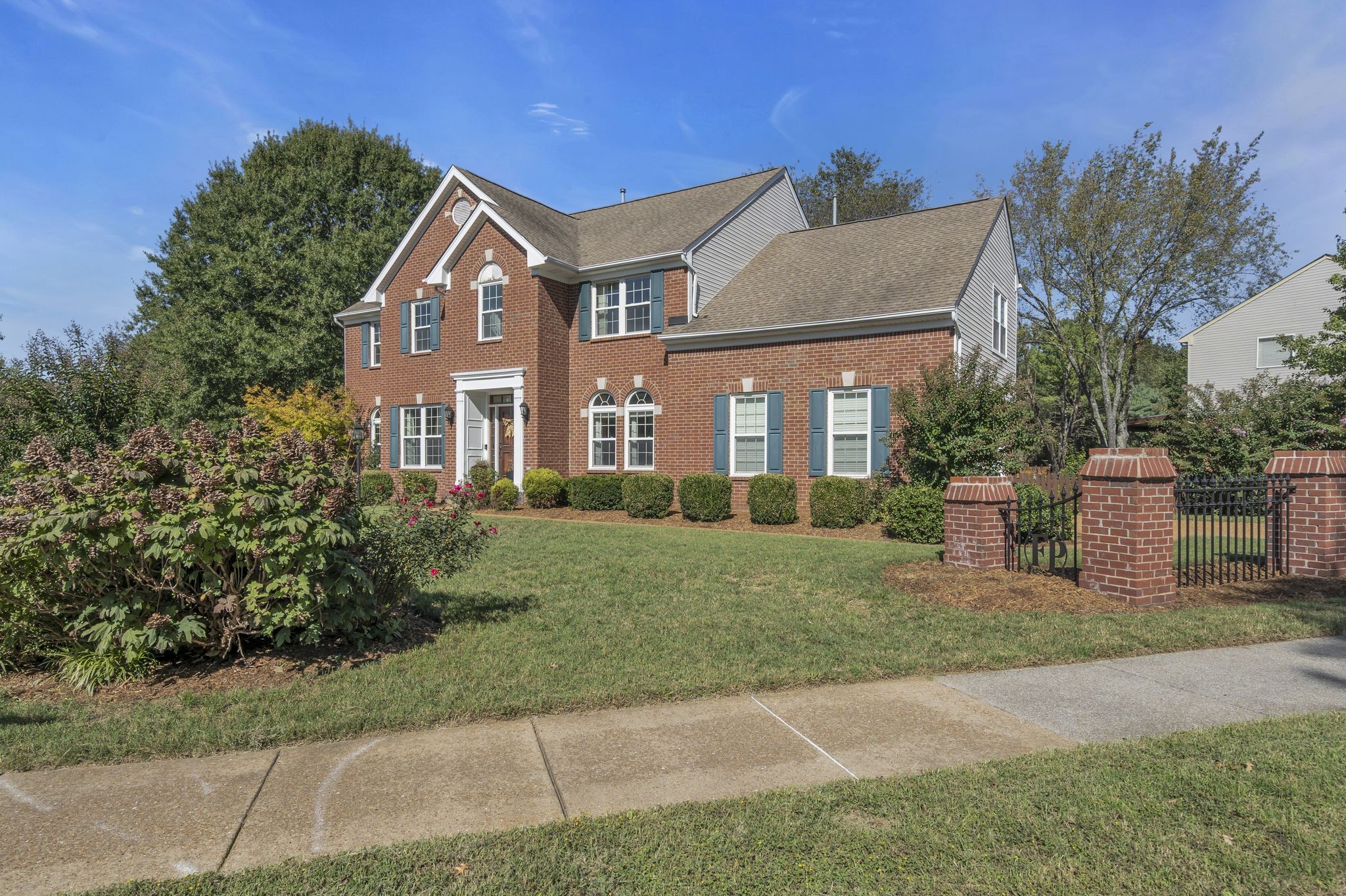 601 Rutherford Lane Franklin, TN 37064 - Photo 2 of 54 a front view of a house with a yard
