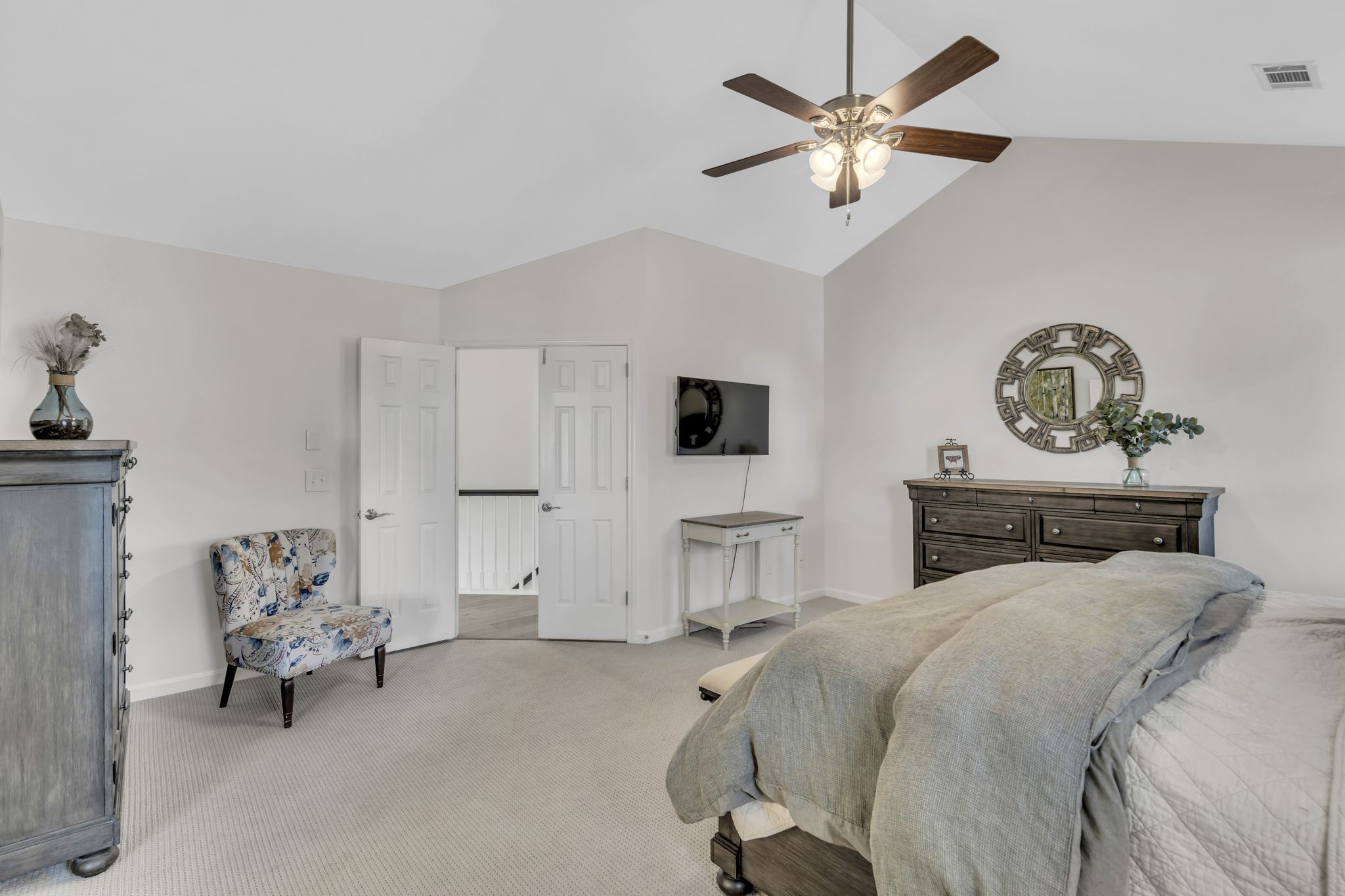 601 Rutherford Lane Franklin, TN 37064 - Photo 24 of 54 a bedroom with a bed and a chandelier