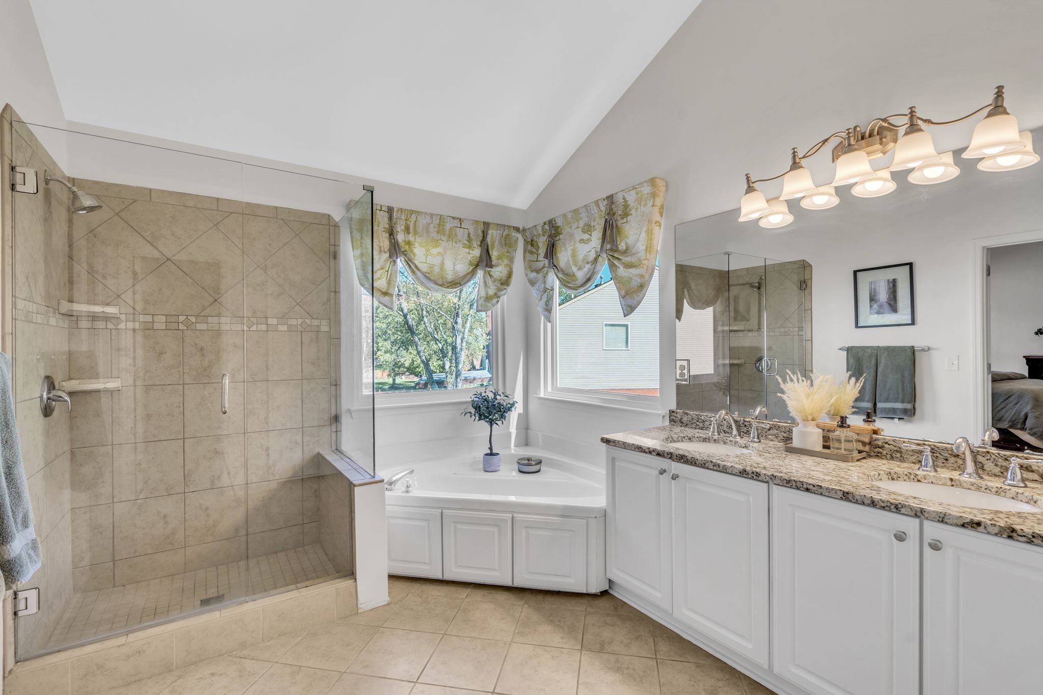 601 Rutherford Lane Franklin, TN 37064 - Photo 26 of 54 a bathroom with a double vanity sink mirror and shower