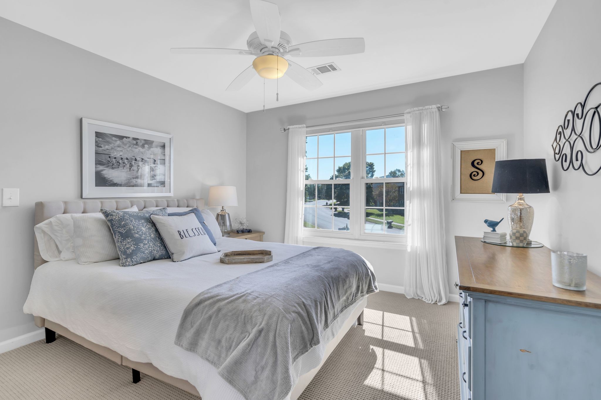 601 Rutherford Lane Franklin, TN 37064 - Photo 34 of 54 a spacious bedroom with a large bed and a flat tv screen on dresser