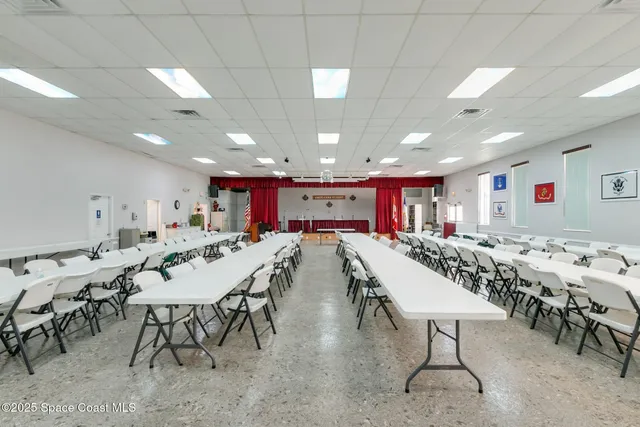 a view of a a dining room with furniture