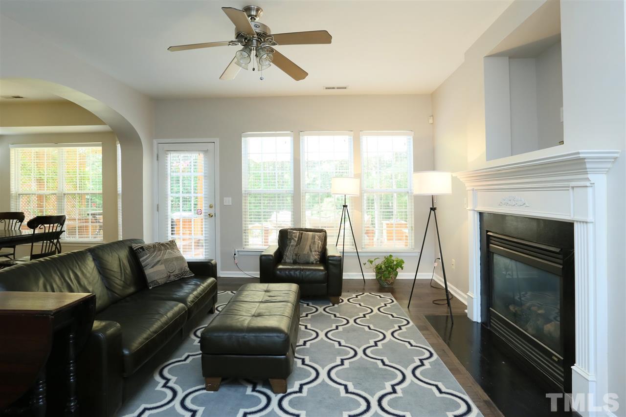 301 Burrell Road Durham, NC 27703 - Photo 3 of 30 a living room with furniture and a fireplace