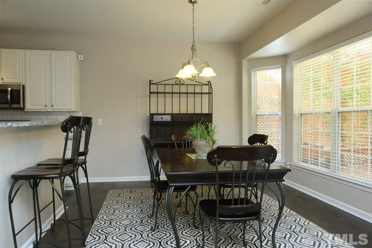 301 Burrell Road Durham, NC 27703 - Photo 9 of 30 a view of a dining room with furniture window and outside view