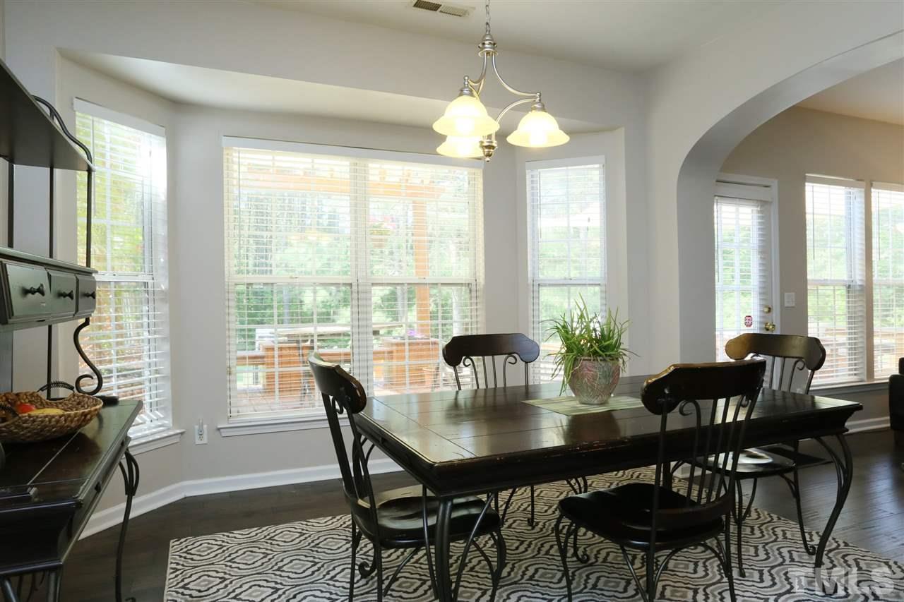 301 Burrell Road Durham, NC 27703 - Photo 10 of 30 a view of a dining room with furniture window and outside view