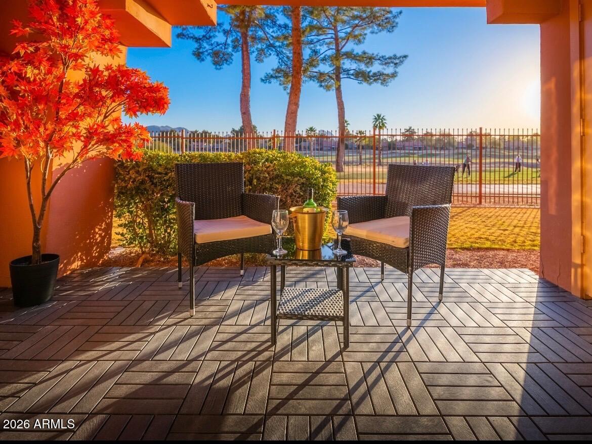4303 East Cactus Road, Unit 128 Phoenix, AZ 85032 - Photo 39 of 39 a view of a terrace with furniture