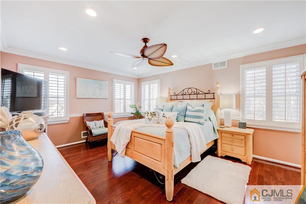 3 Old Road Monroe Township, NJ 08831 - Photo 15 of 25 a bedroom with a bed and wooden floor