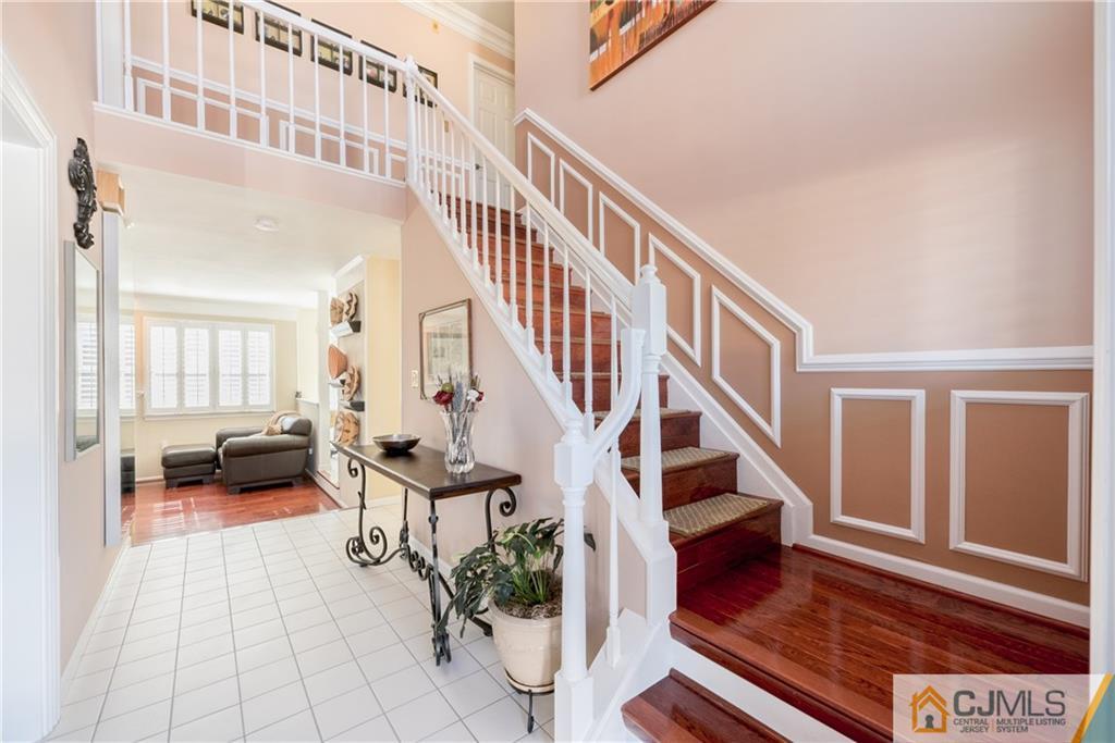 3 Old Road Monroe Township, NJ 08831 - Photo 3 of 25 a view of an entryway with wooden floor and a rug