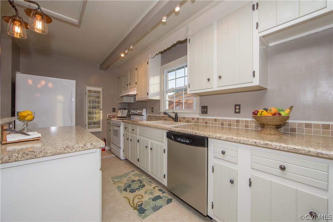 7760 Drexelbrook Road Chesterfield, VA 23832 - Photo 9 of 24 a kitchen with granite countertop cabinets stainless steel appliances a sink and a counter top space