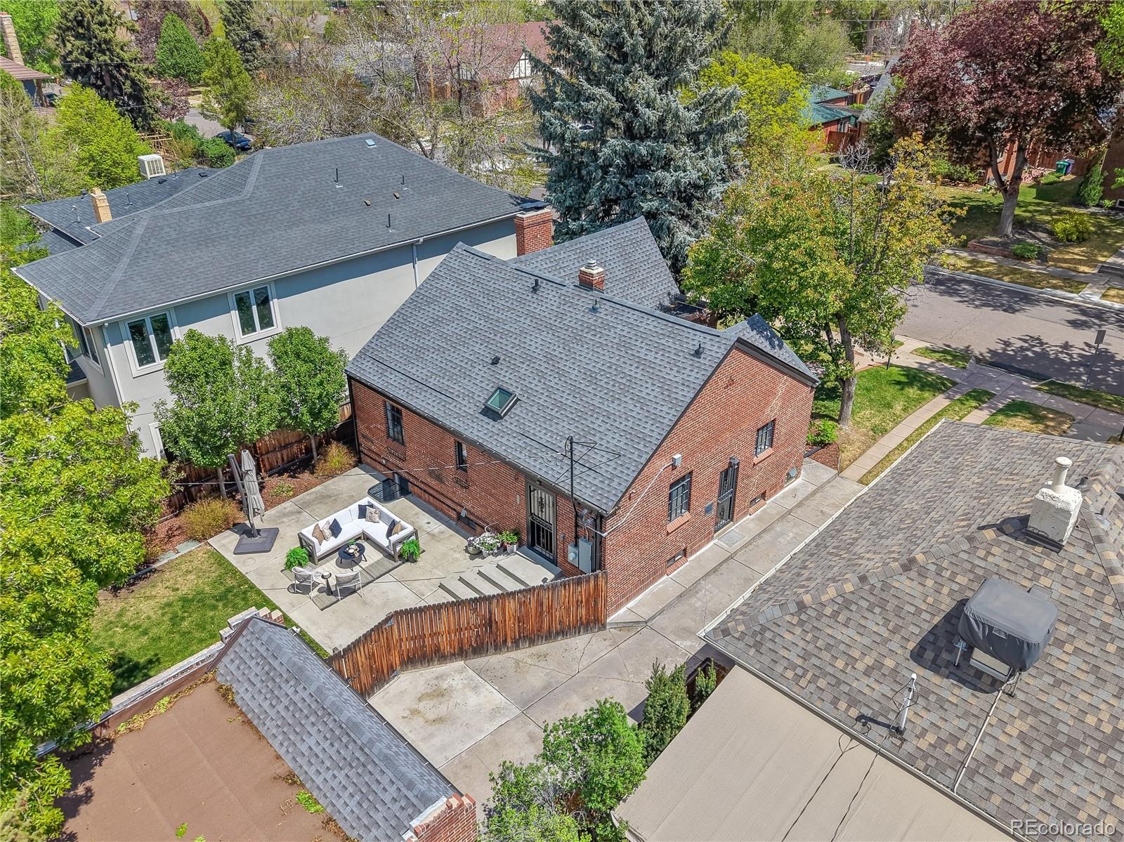 1375 Birch Street Denver, CO 80220 - Photo 23 of 27 an aerial view of a house with a yard