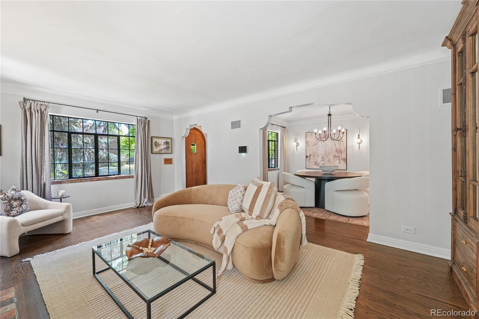 1375 Birch Street Denver, CO 80220 - Photo 5 of 27 a living room with furniture and wooden floor