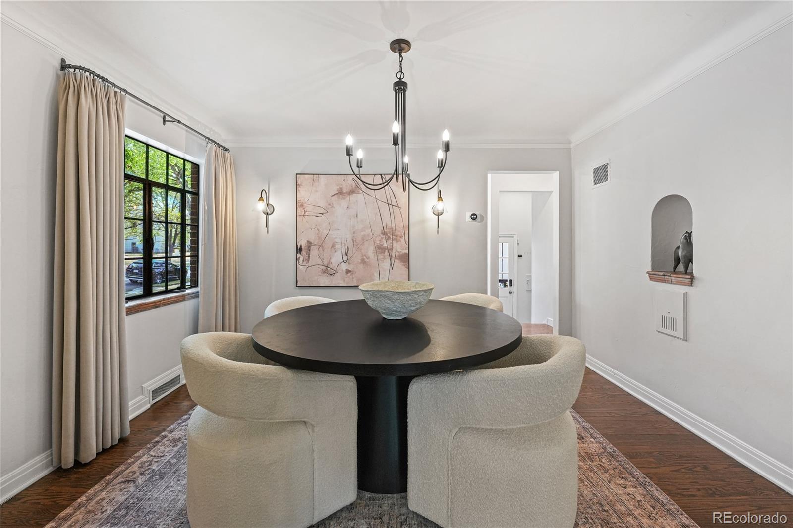 1375 Birch Street Denver, CO 80220 - Photo 6 of 27 a dining room with table and chairs