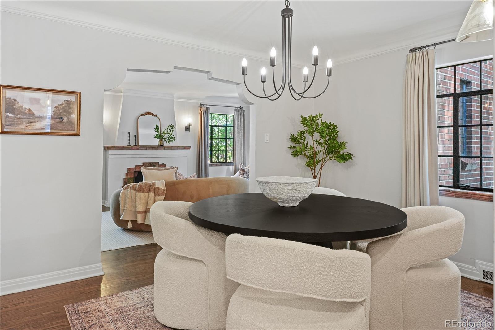 1375 Birch Street Denver, CO 80220 - Photo 7 of 27 a dining room with table and chairs