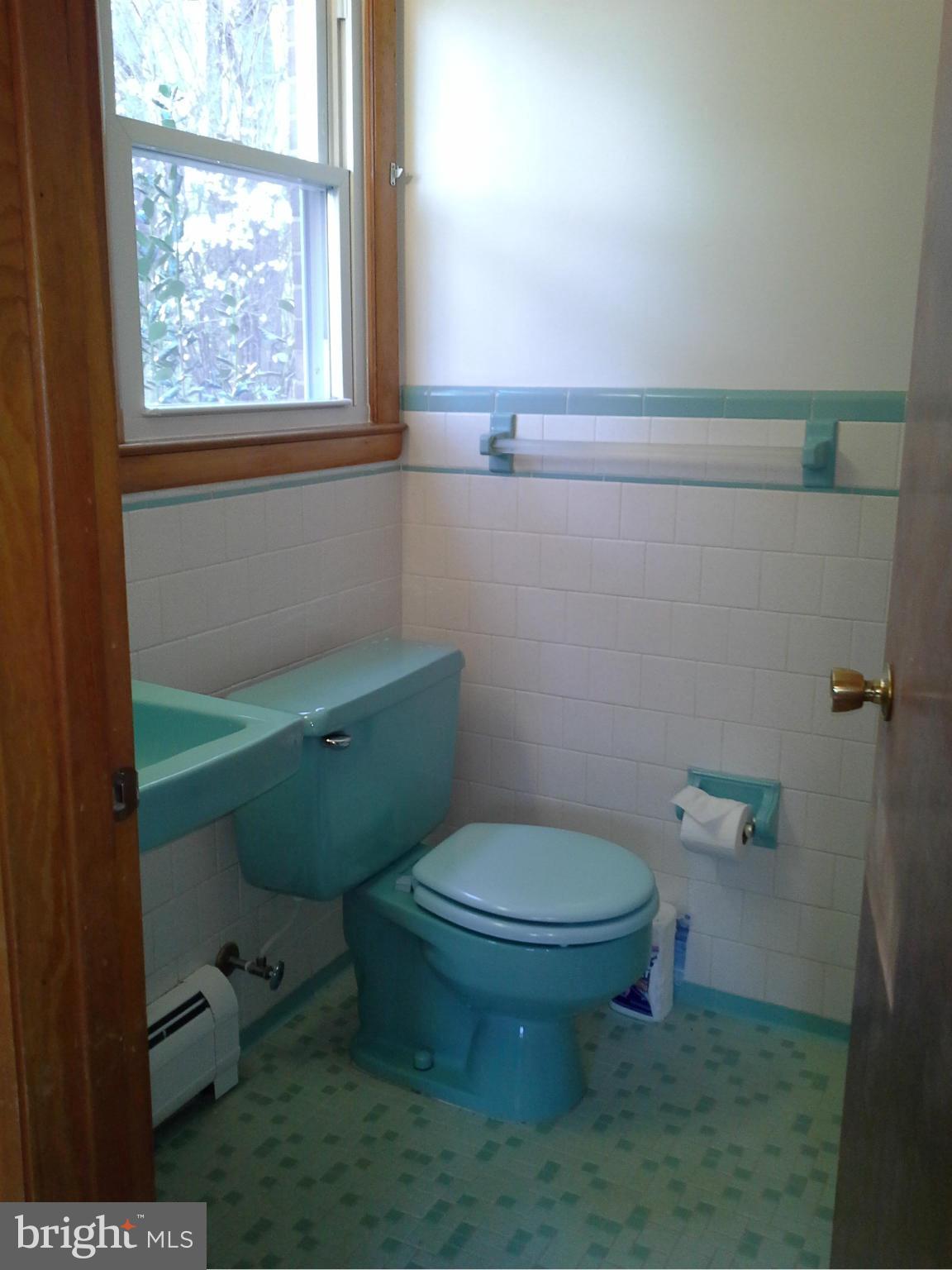 9912 Fox Hill Road Perry Hall, MD 21128 - Photo 18 of 26 a bathroom with a toilet and a sink