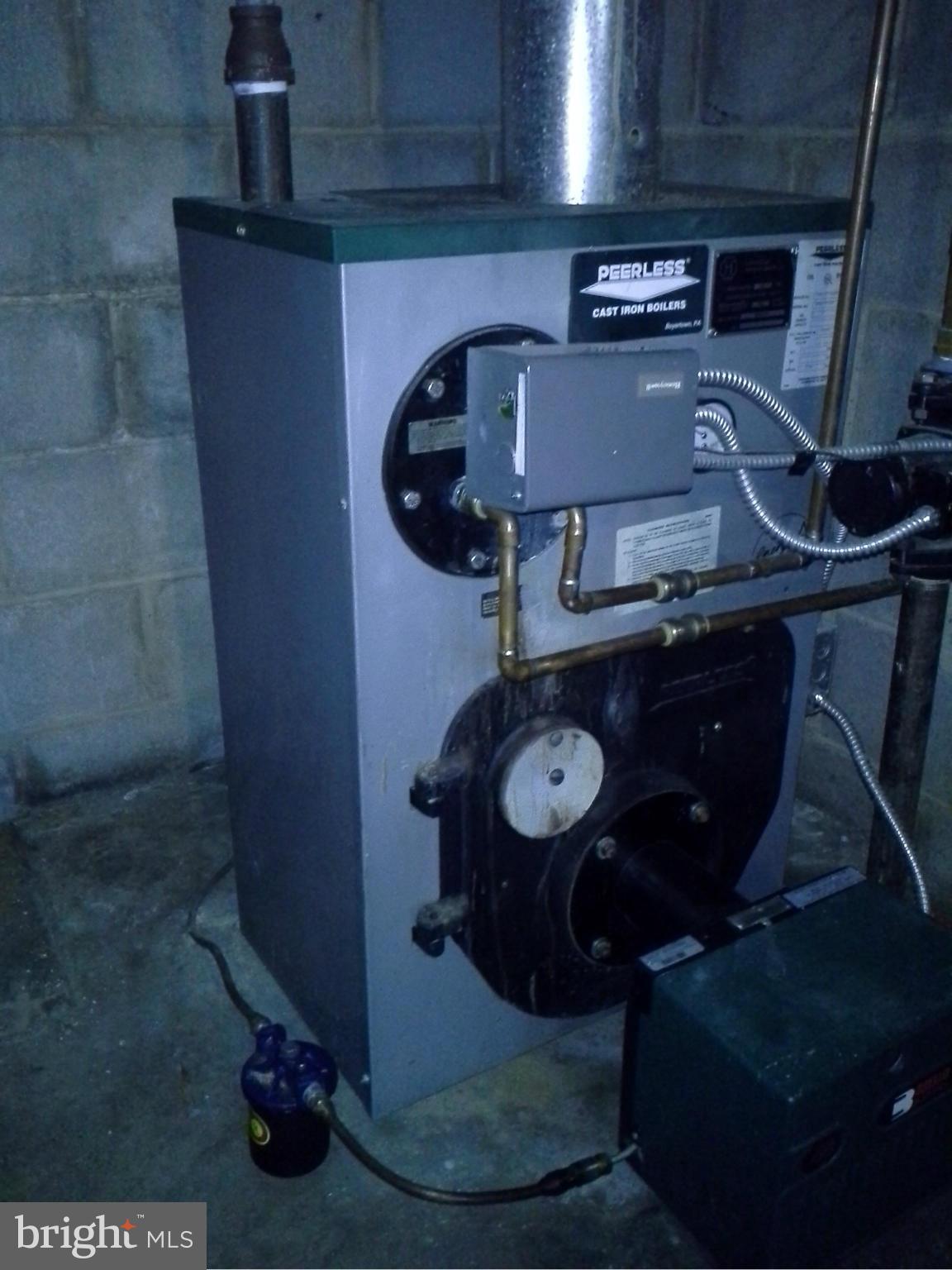 9912 Fox Hill Road Perry Hall, MD 21128 - Photo 23 of 26 a close view of water heater