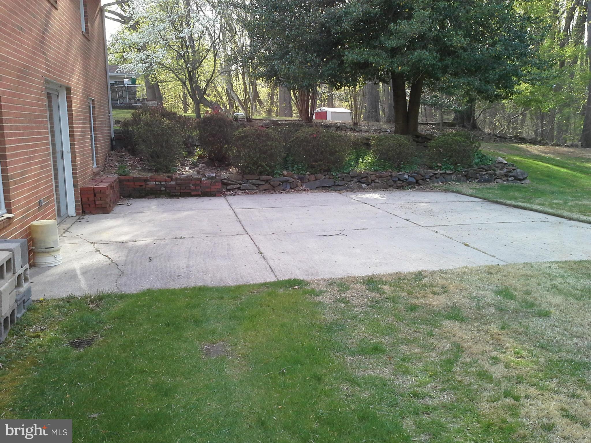 9912 Fox Hill Road Perry Hall, MD 21128 - Photo 6 of 26 a view of a yard with plants and trees
