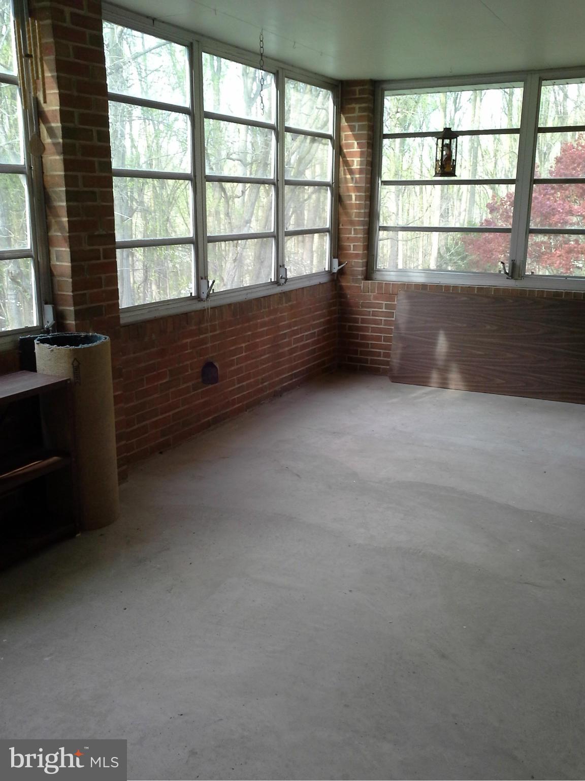9912 Fox Hill Road Perry Hall, MD 21128 - Photo 8 of 26 an empty room with large windows