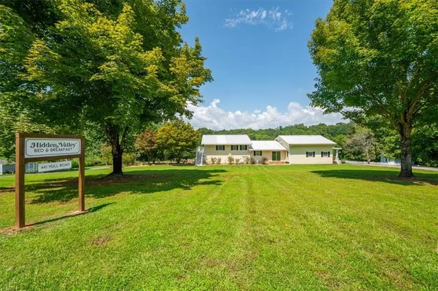 a view of a balcony with wooden floor