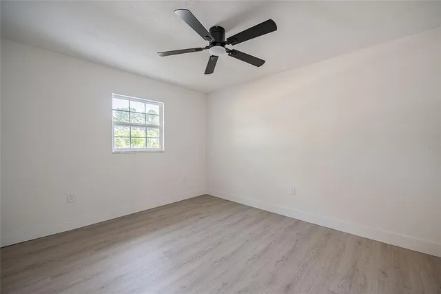 a house view with a backyard space