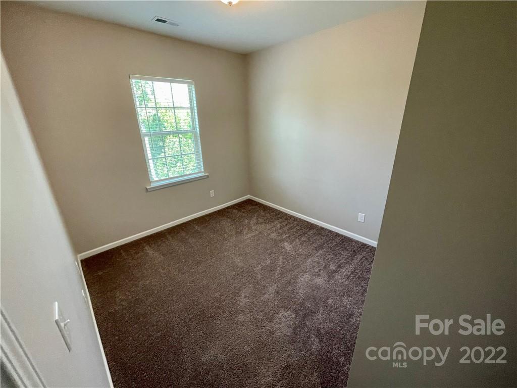 715 Swift Run Tega Cay, SC 29708 - Photo 18 of 24 an empty room with a window