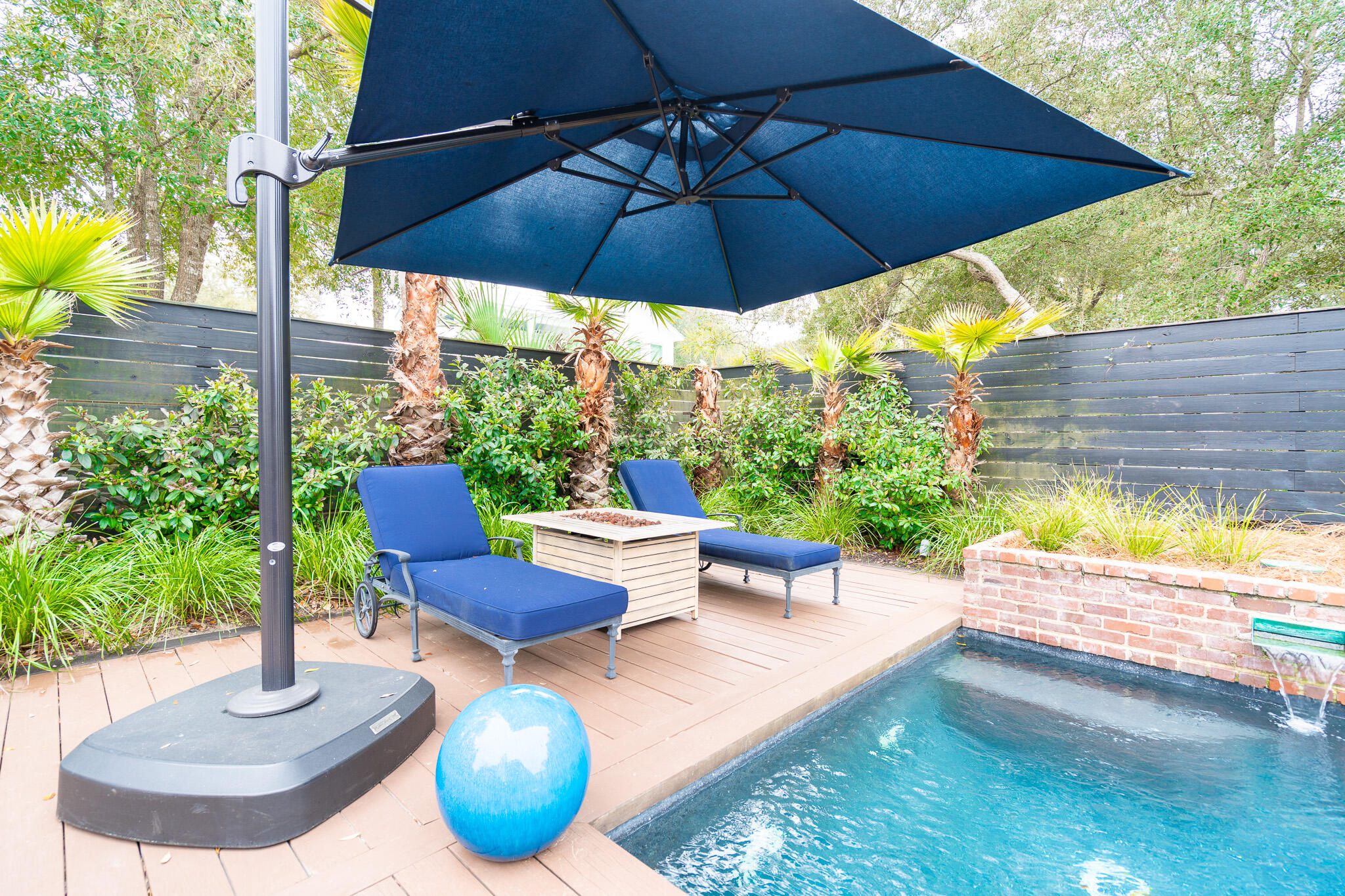 102 Camp Creek Road South Inlet Beach, FL 32461 - Photo 53 of 73 a view of an outdoor sitting area with swimming pool