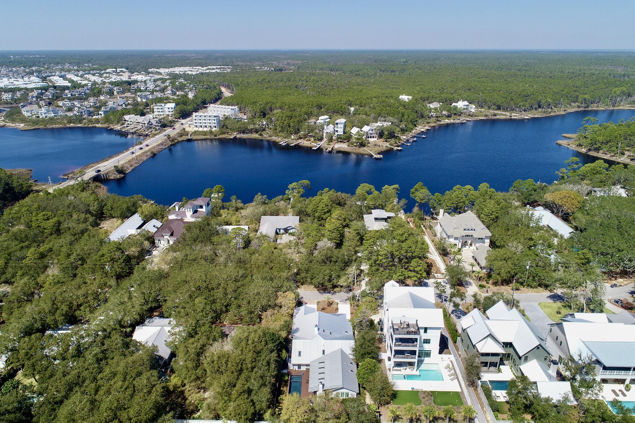 102 Camp Creek Road South Inlet Beach, FL 32461 - Photo 67 of 73 an aerial view of ocean residential houses with outdoor space and trees all around