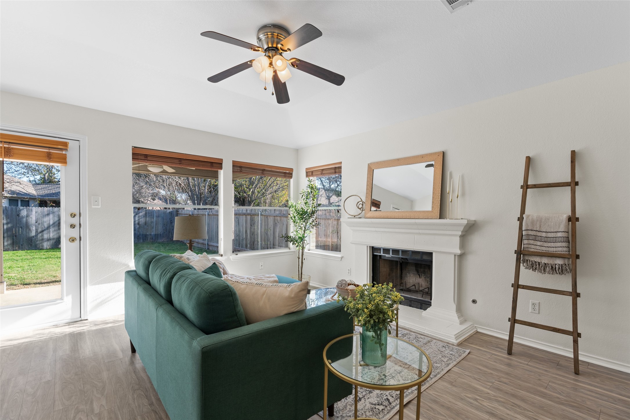 8430 Alvin High Lane Austin, TX 78729 - Photo 13 of 31 a living room with furniture and a fireplace