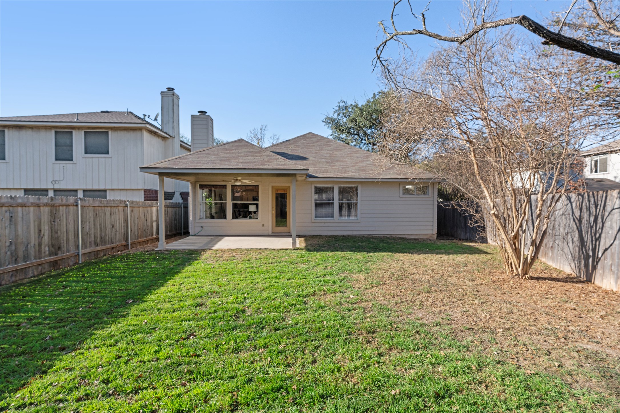 8430 Alvin High Lane Austin, TX 78729 - Photo 23 of 31 a front view of a house with garden