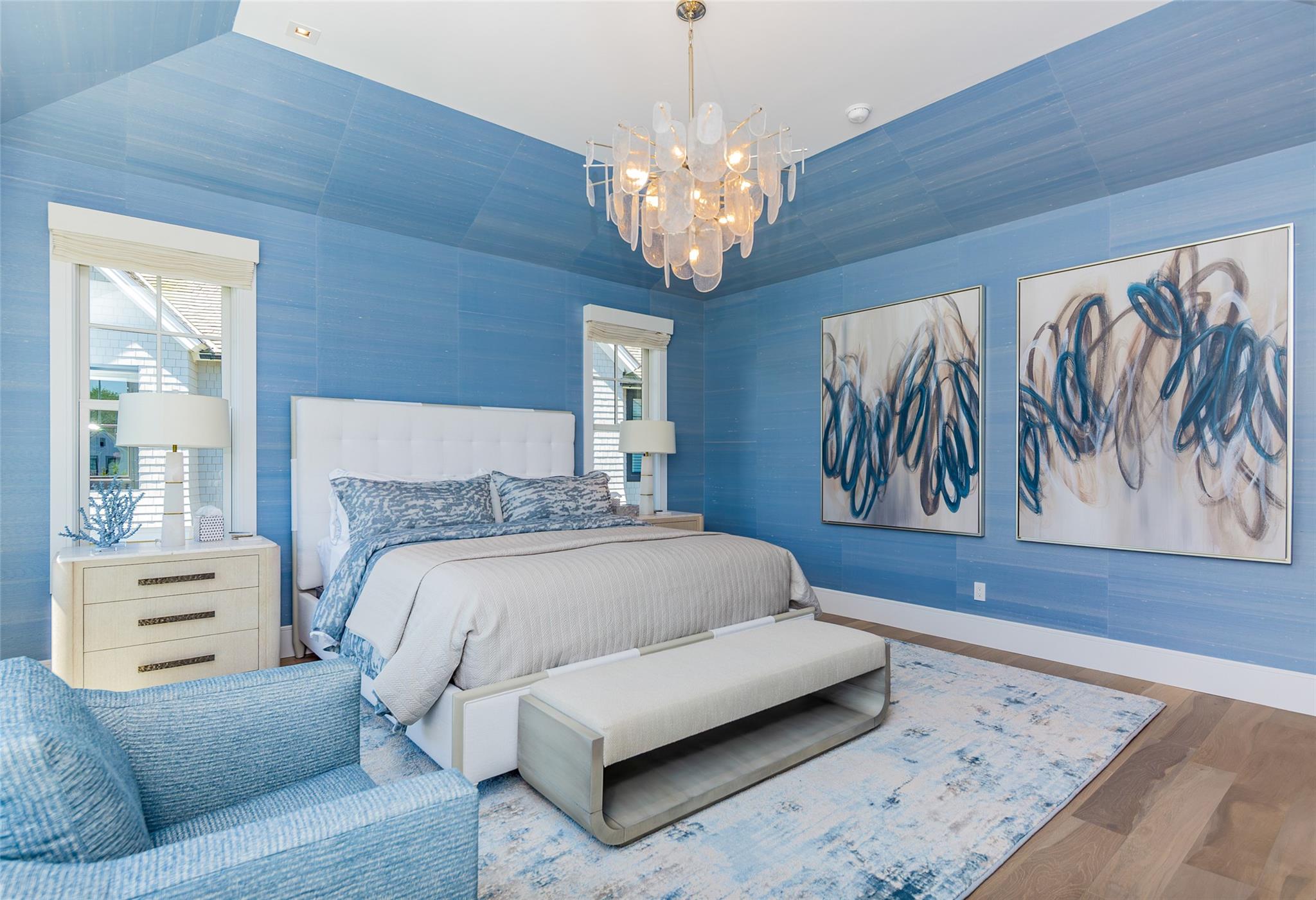 1 Spruce Court Water Mill, NY 11976 - Photo 17 of 35 Bedroom with a chandelier and wood finished floors