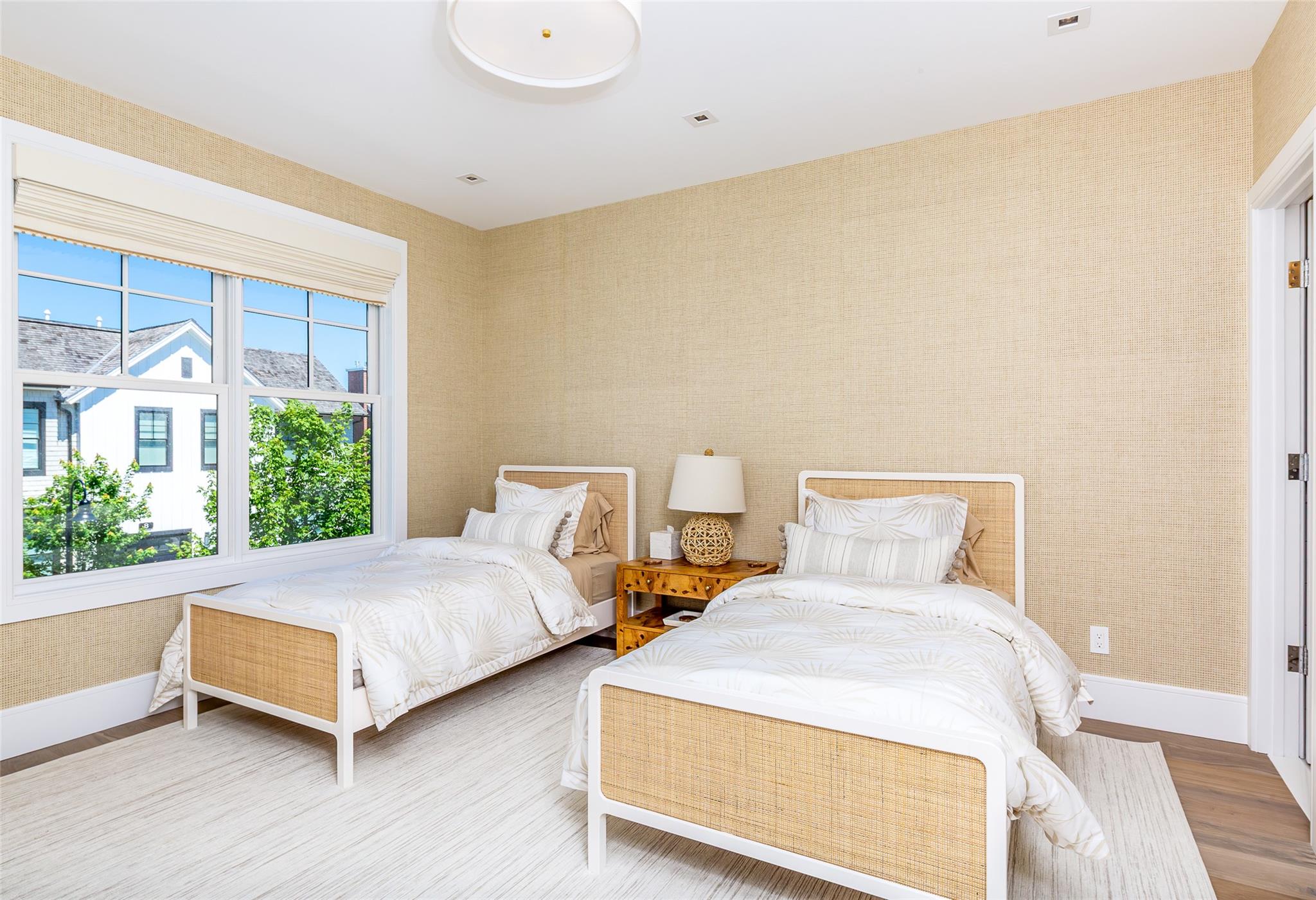 1 Spruce Court Water Mill, NY 11976 - Photo 21 of 35 Bedroom featuring wood finished floors and wallpapered walls