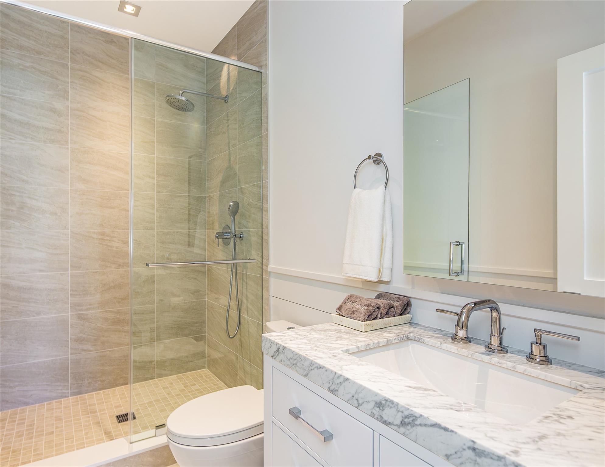 1 Spruce Court Water Mill, NY 11976 - Photo 22 of 35 Bathroom featuring vanity and a shower stall