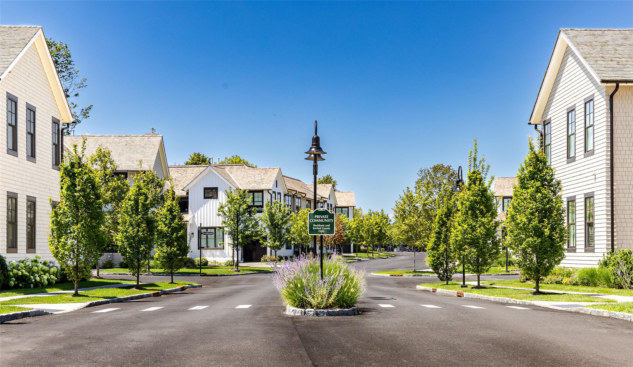 1 Spruce Court Water Mill, NY 11976 - Photo 32 of 35 View of asphalt street with curbs, sidewalks, a residential view, and street lighting
