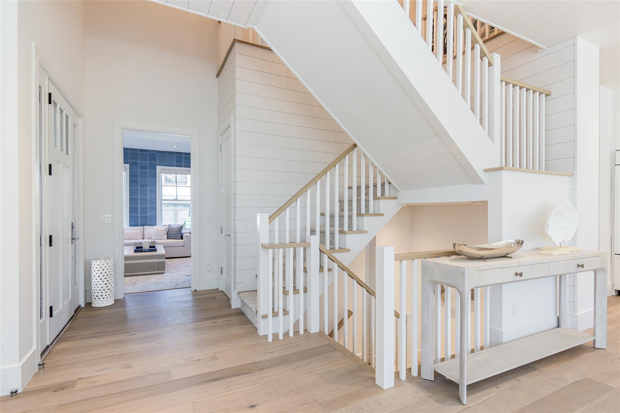 1 Spruce Court Water Mill, NY 11976 - Photo 4 of 35 Stairs featuring wood finished floors and a towering ceiling