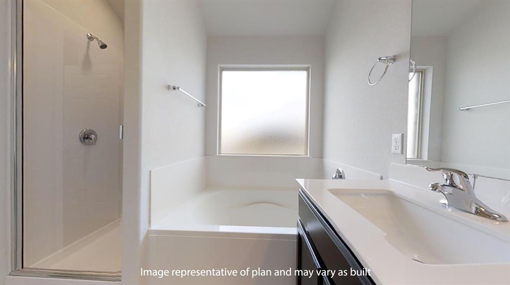 5800 Foggy Lagoon Drive Waco, TX 76708 - Photo 18 of 24 a bathroom with a tub sink and mirror