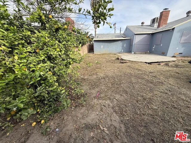 a house with trees in front of it