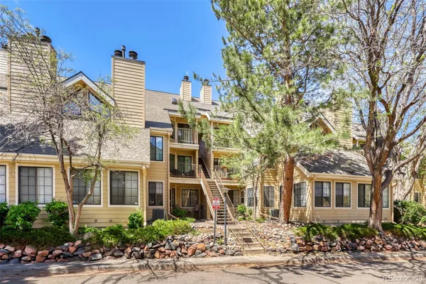 front view of a building with a yard