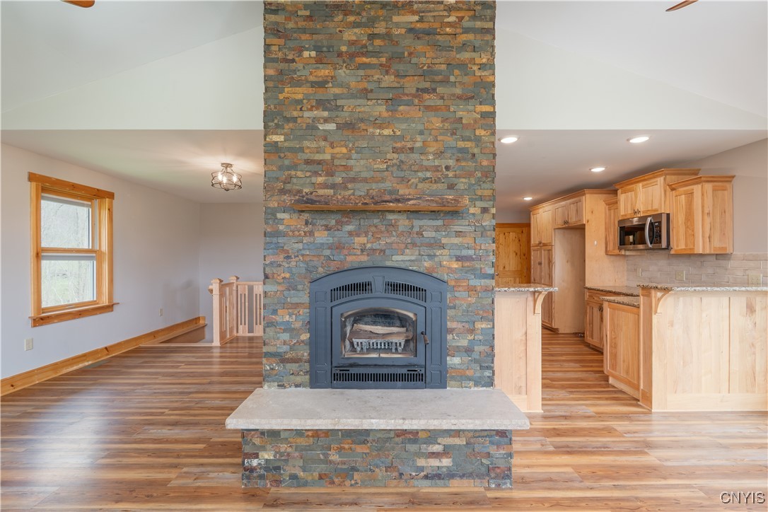 5689 Holmes Hill Road Conesus, NY 14435 - Photo 11 of 45 Cozy wood stove for those cold winters.