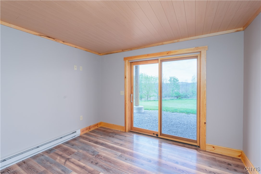 5689 Holmes Hill Road Conesus, NY 14435 - Photo 30 of 45 Sliding door off Bedroom opens to front yard.