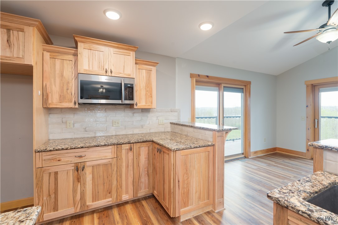 5689 Holmes Hill Road Conesus, NY 14435 - Photo 7 of 45 Breakfast bar right off kitchen area.