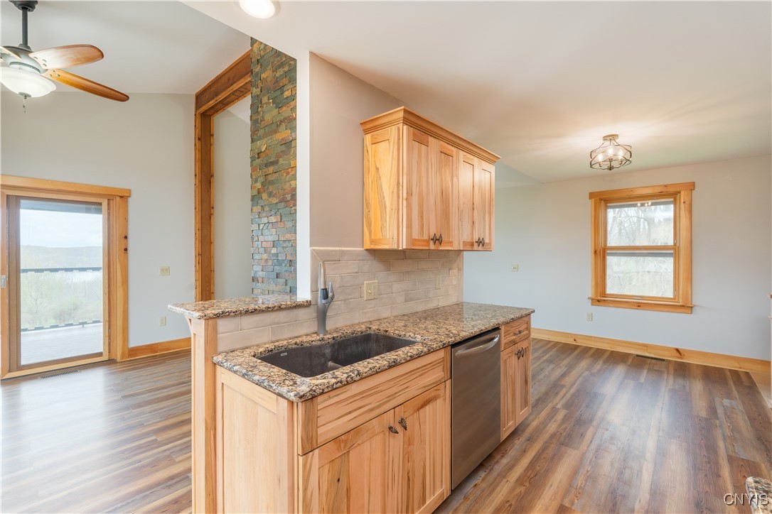 5689 Holmes Hill Road Conesus, NY 14435 - Photo 8 of 45 Sink overlooking living room, and backyard view