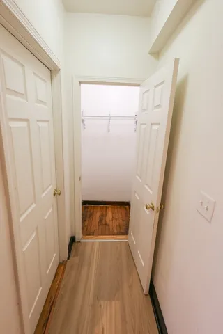 a view of entryway with wooden floor